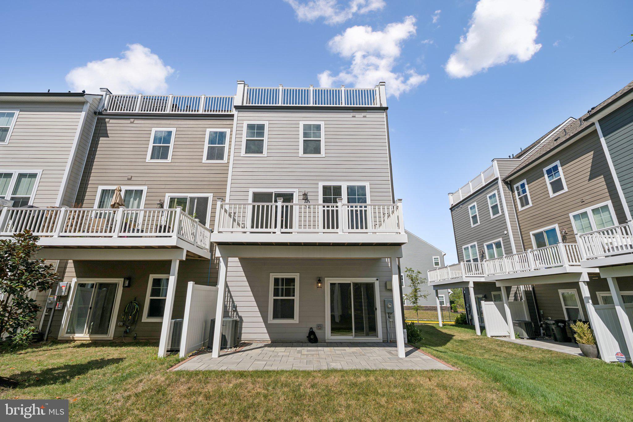 1655 Aspen Poplar Road Dumfries, VA 22026 - Photo 4 of 57 a view of a building with a yard