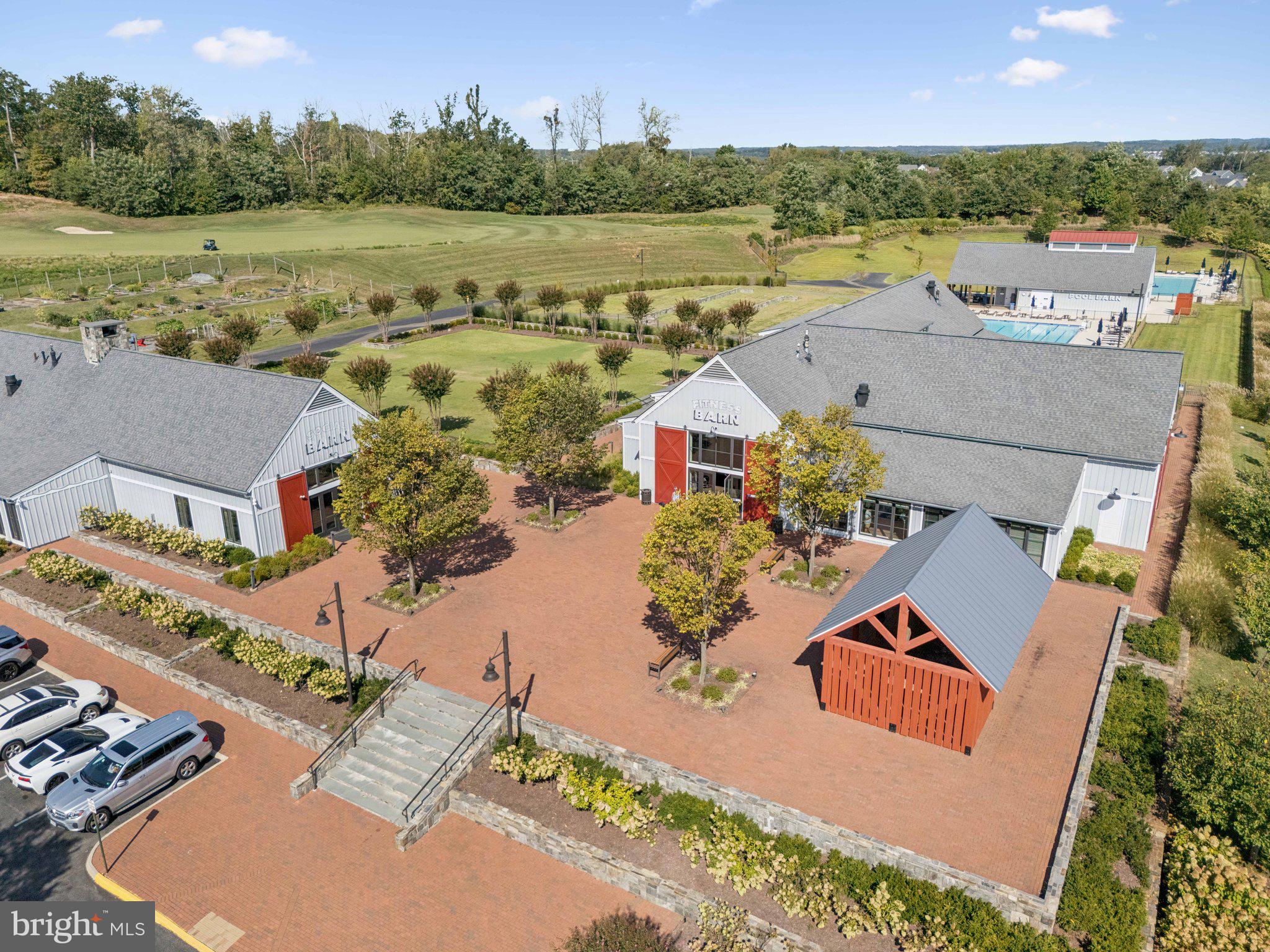 1655 Aspen Poplar Road Dumfries, VA 22026 - Photo 45 of 57 an aerial view of residential houses with outdoor space and ocean view