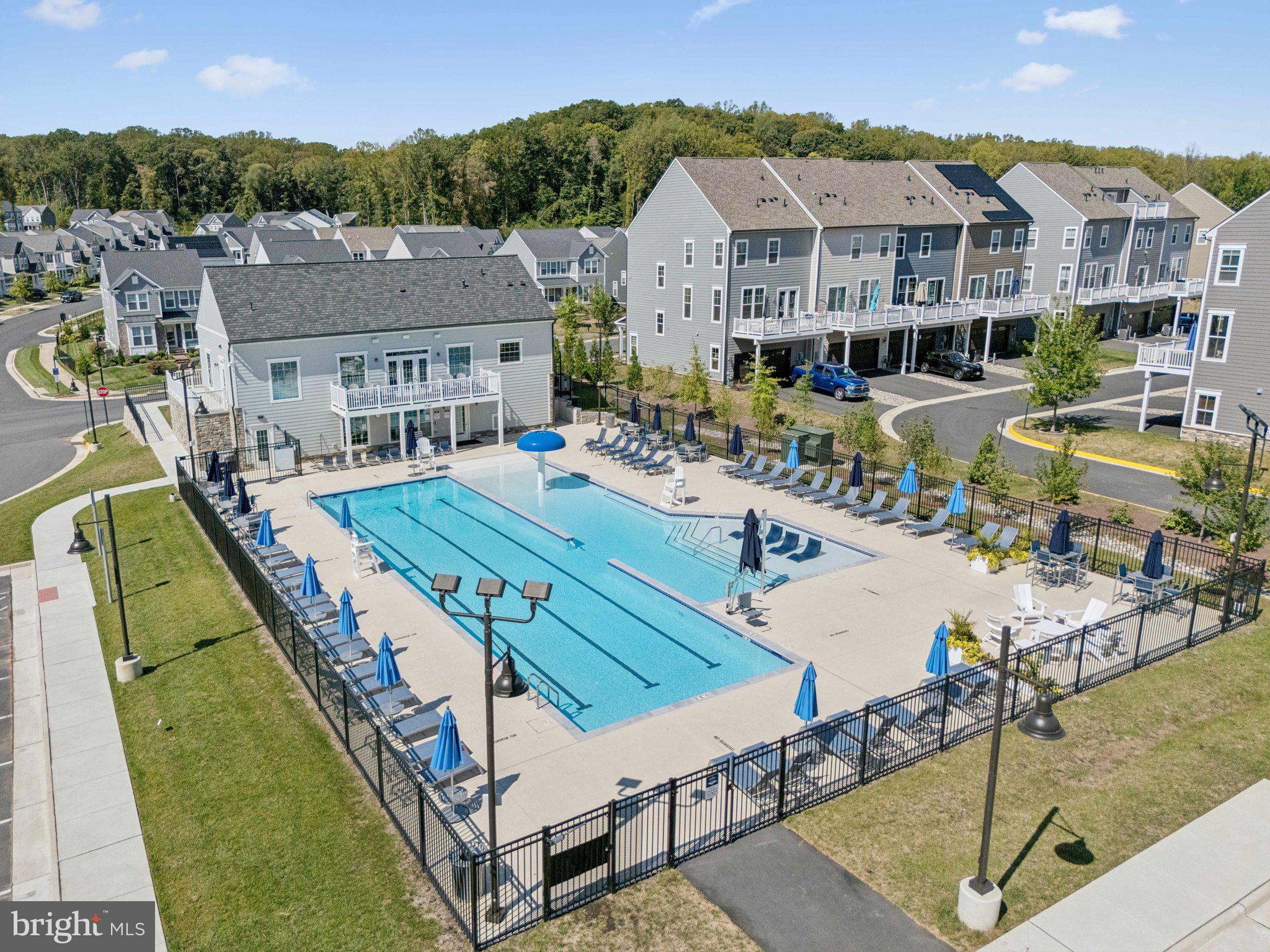 1655 Aspen Poplar Road Dumfries, VA 22026 - Photo 48 of 57 a aerial view of a house with a swimming pool