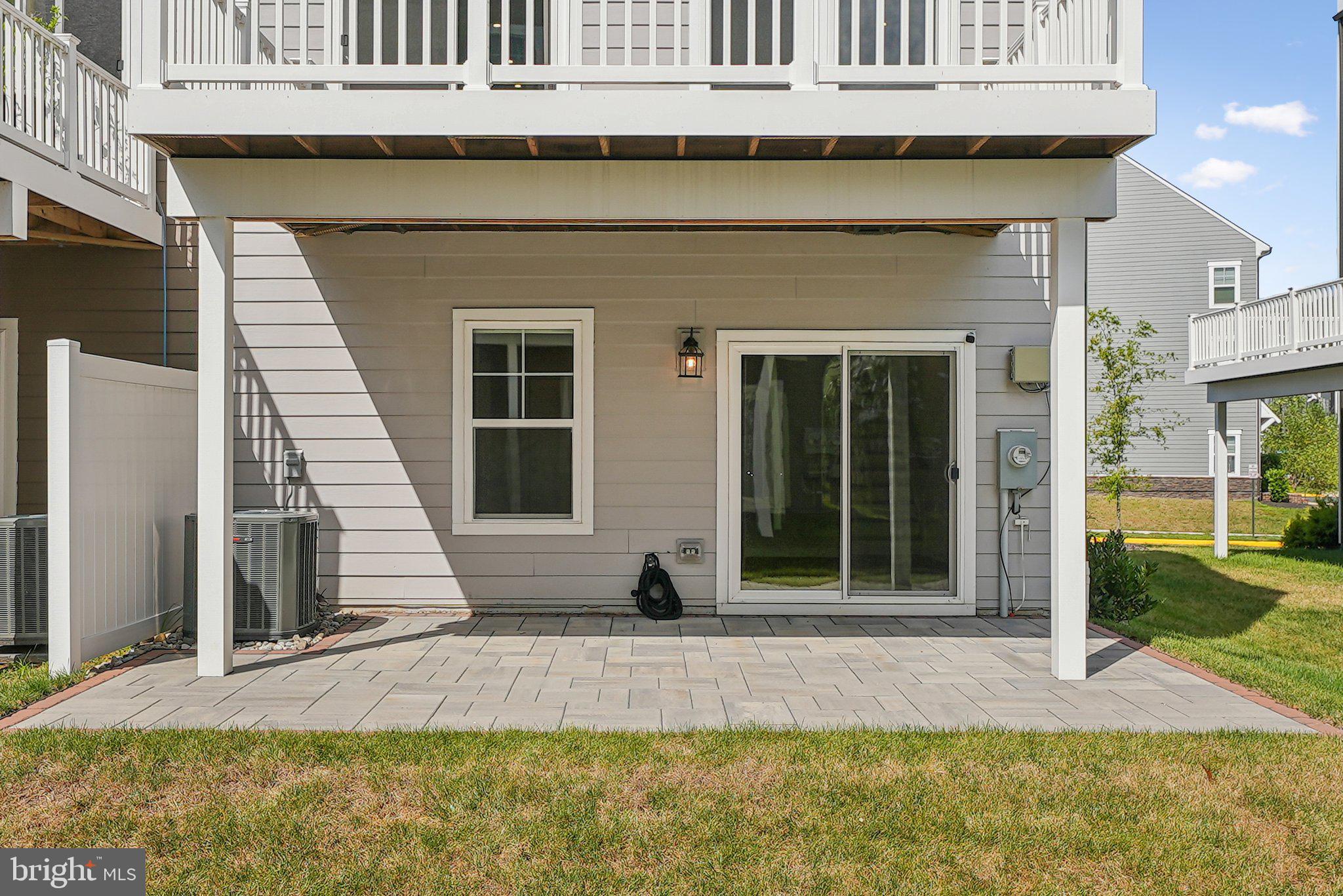 1655 Aspen Poplar Road Dumfries, VA 22026 - Photo 5 of 57 a view of a entryway with a garden