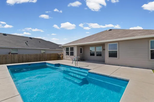 a view of swimming pool with mountain view