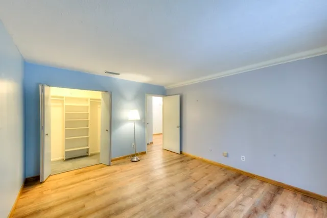 a view of an empty room and window