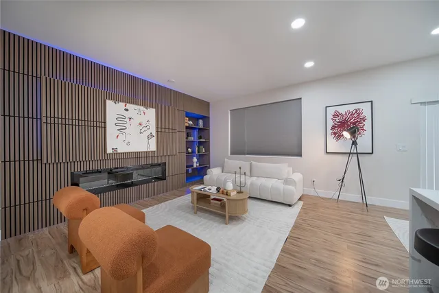 a living room with furniture or couch and a flat screen tv