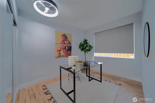 a workspace with furniture and window