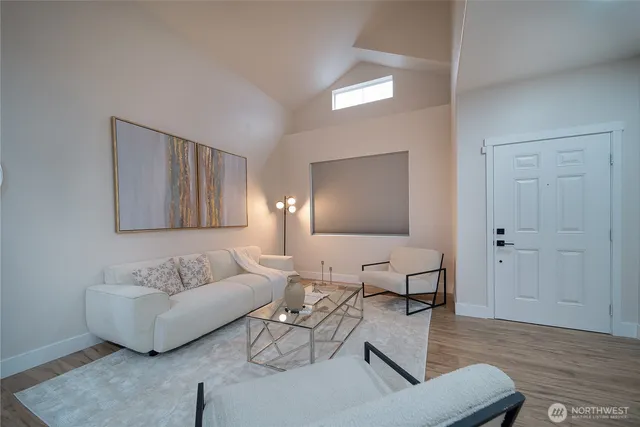 a living room with furniture and a couch