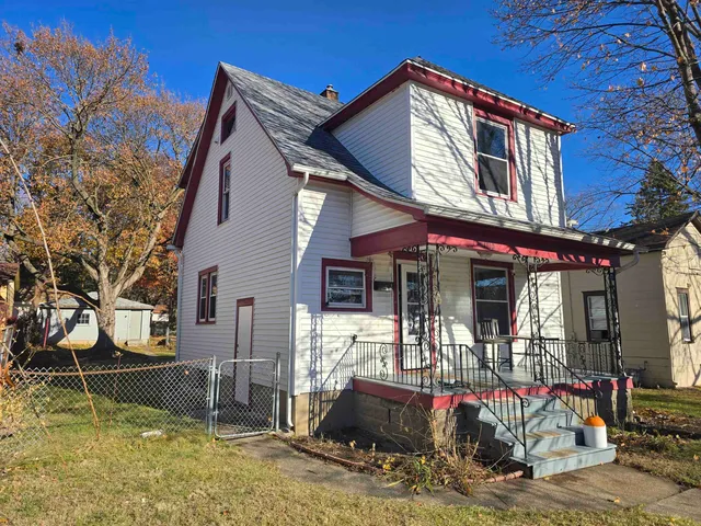 a view of a house with a patio