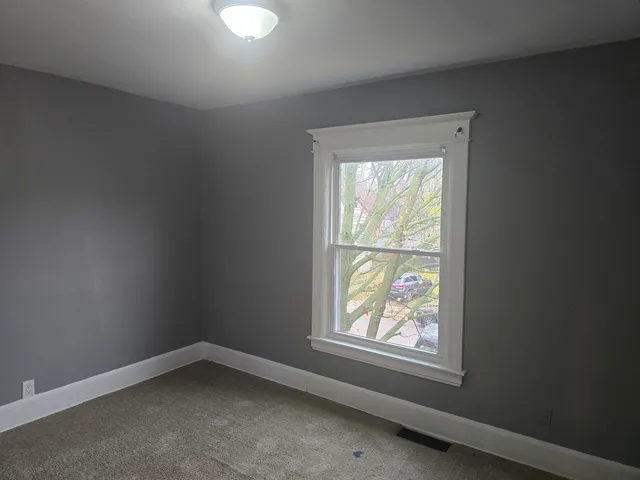 an empty room with windows