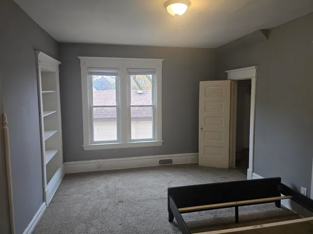 an empty room with windows