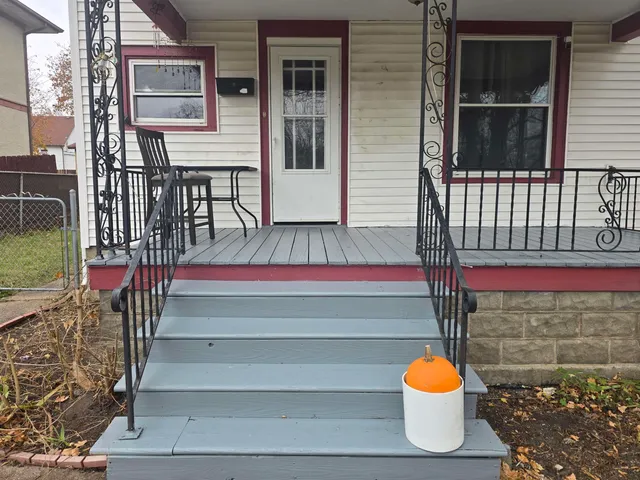 a front view of a house with a porch