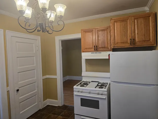 a kitchen with a stove and a microwave