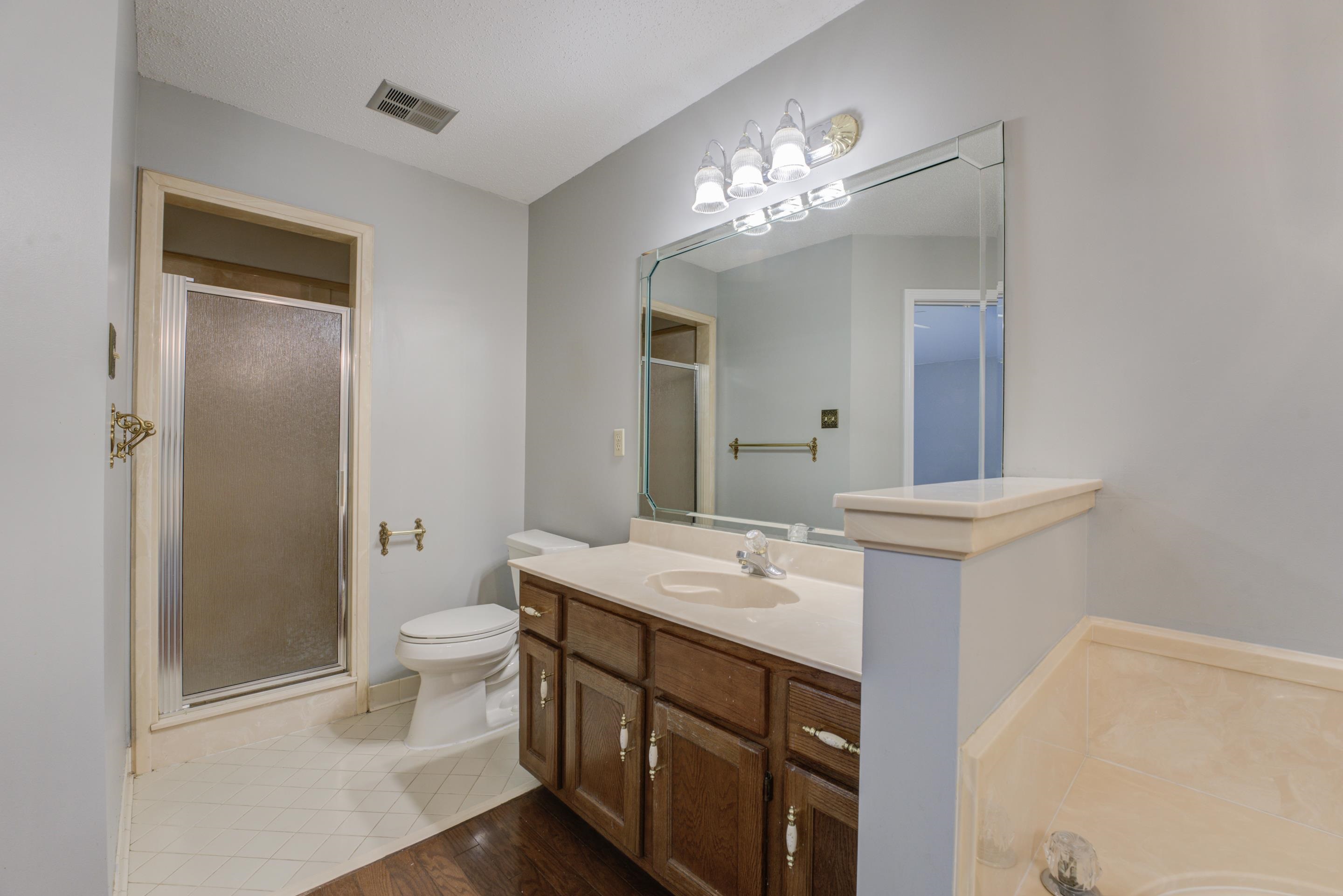 6387 St Elmo Road Bartlett, TN 38135 - Photo 16 of 30 Come home after a long day and take a steamy shower in the primary bathroom.