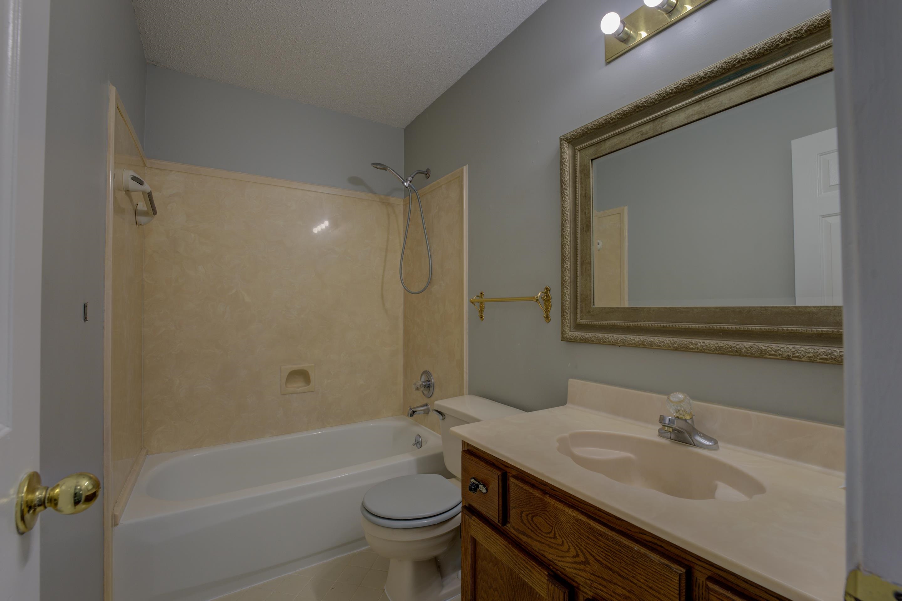 6387 St Elmo Road Bartlett, TN 38135 - Photo 20 of 30 This full bathroom has tile flooring and a tub/shower combination.