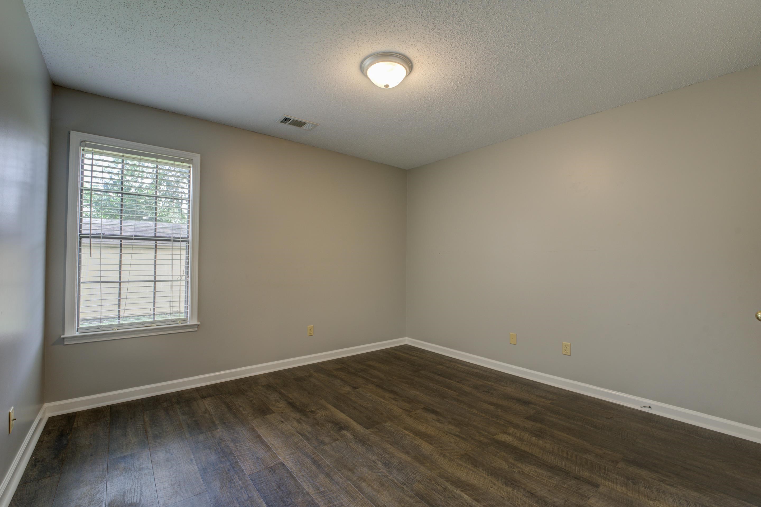 6387 St Elmo Road Bartlett, TN 38135 - Photo 21 of 30 Relax at days end in the third bedroom with wood floors and closet.