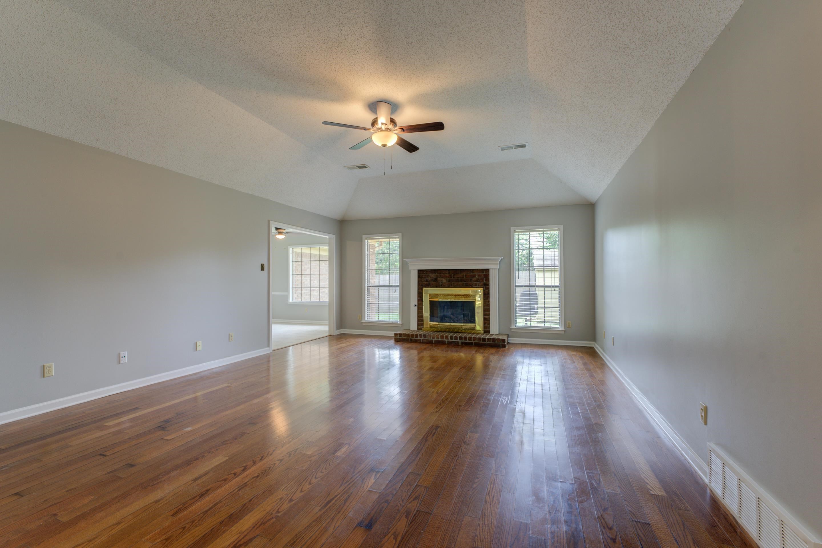 Relax in the spacious great room and snuggle up beside the cozy gas log fireplace.