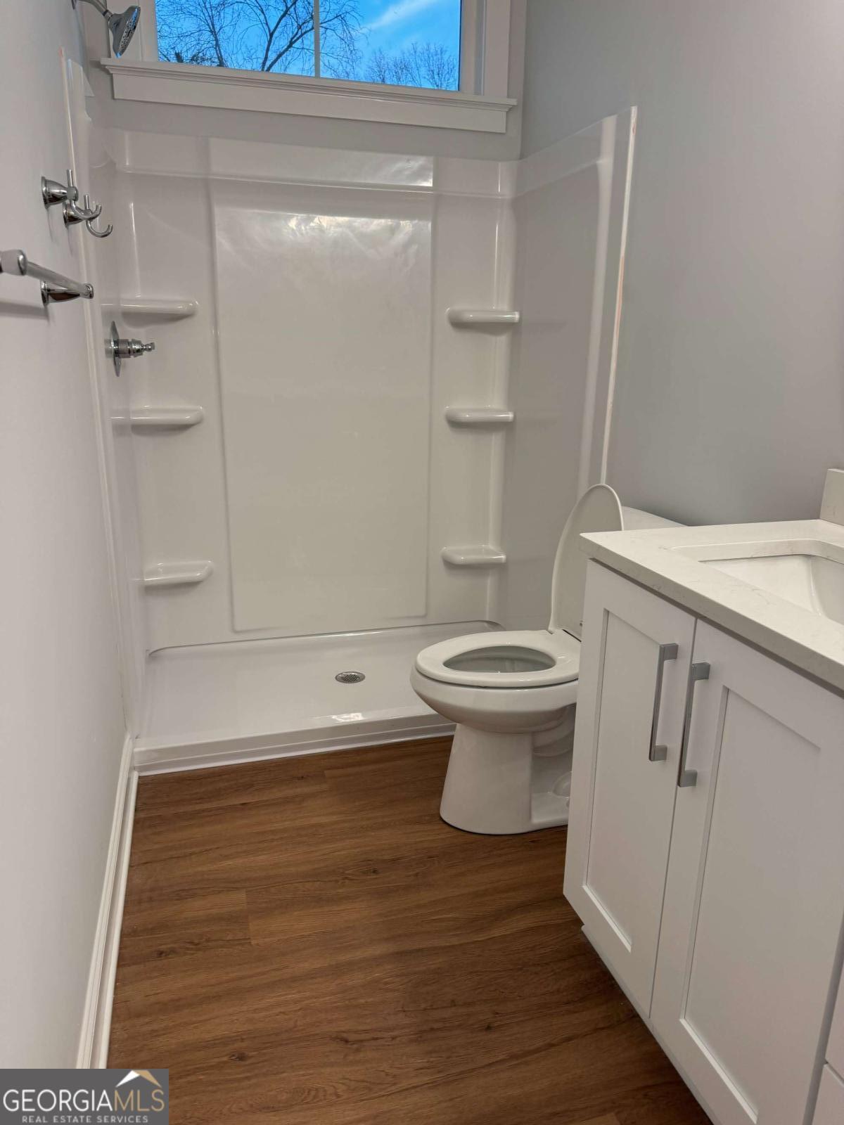 350 Rucker Lane, Unit B Statesboro, GA 30458 - Photo 12 of 20 a bathroom with a sink and a toilet