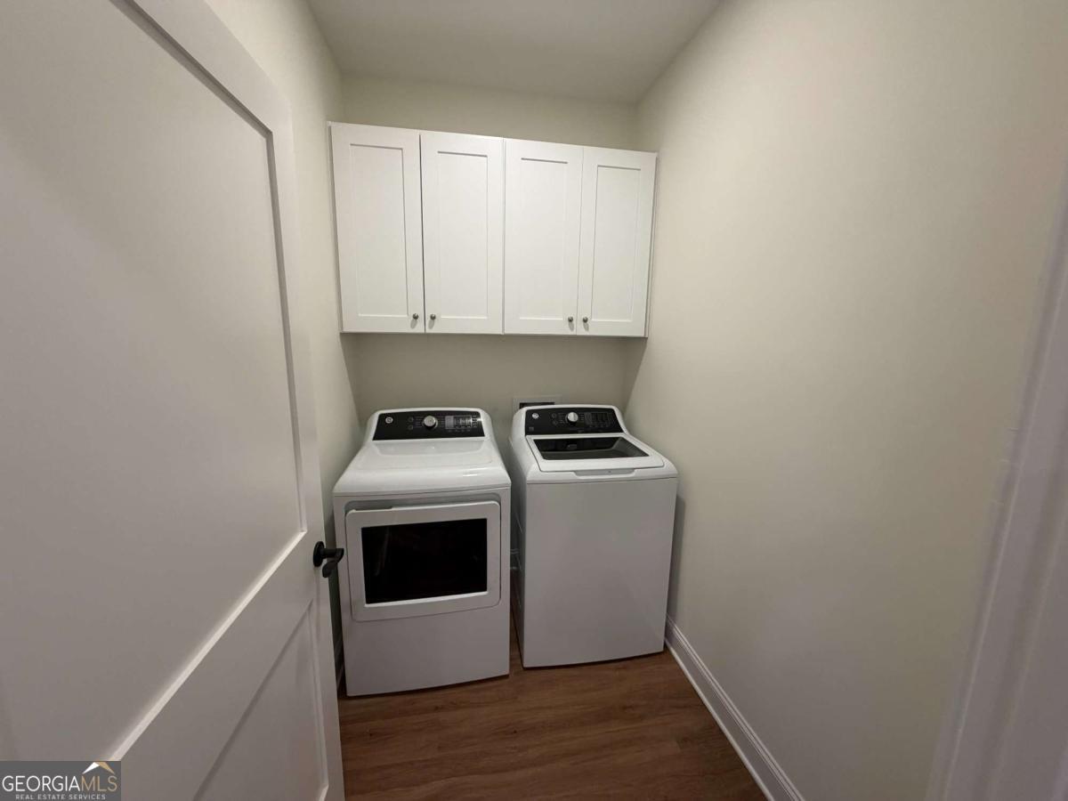 350 Rucker Lane, Unit B Statesboro, GA 30458 - Photo 19 of 20 a view of utility room with washer and dryer