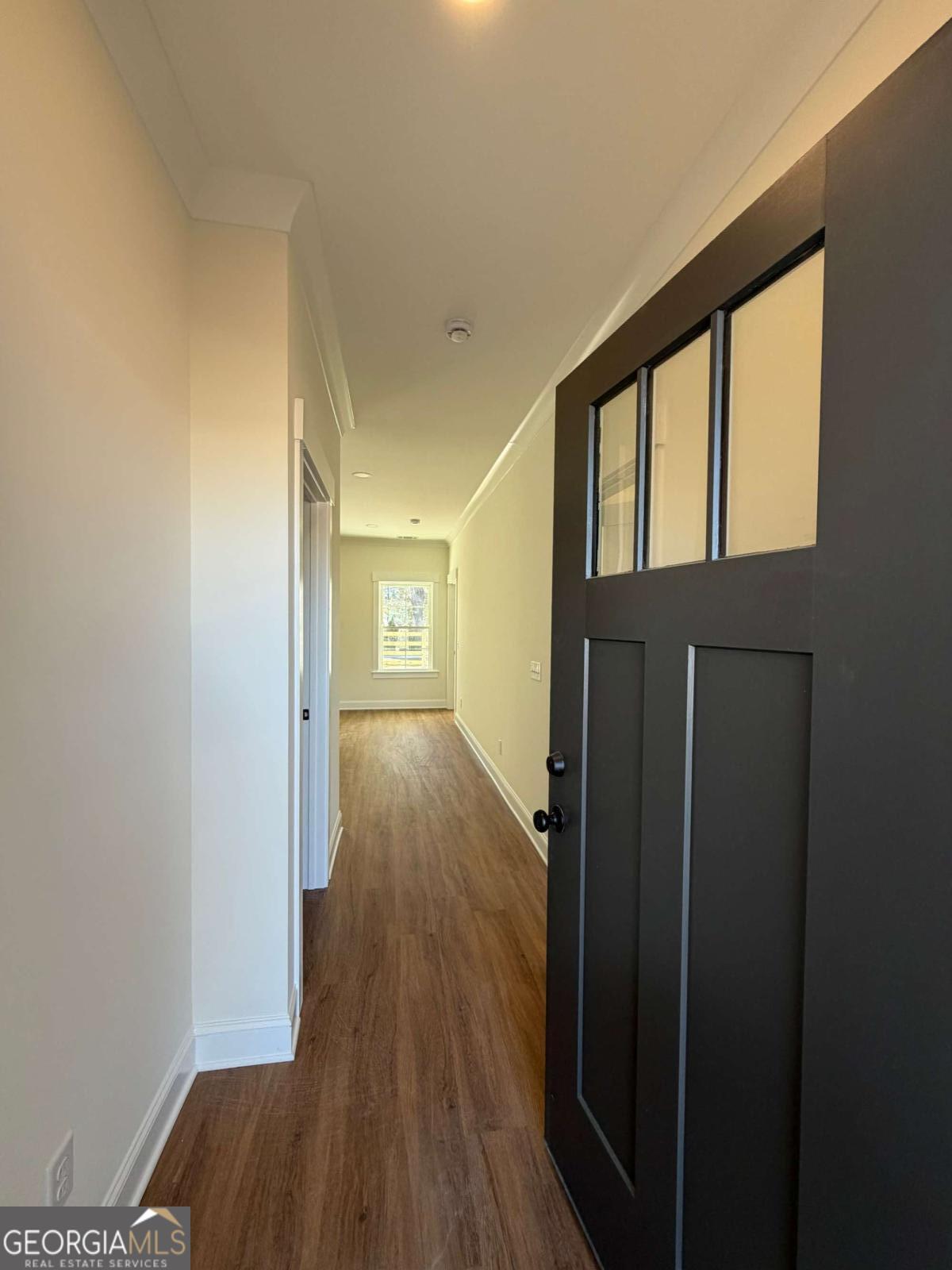 350 Rucker Lane, Unit B Statesboro, GA 30458 - Photo 2 of 20 a view of hallway with wooden floor