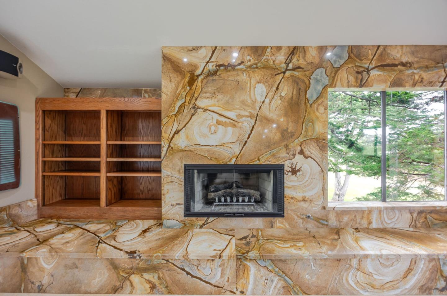 15 Ashdown Place Half Moon Bay, CA 94019 - Photo 19 of 53 a living room with a rug and a fireplace