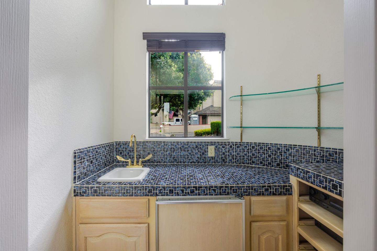15 Ashdown Place Half Moon Bay, CA 94019 - Photo 20 of 53 a bathroom with a granite countertop sink and a mirror