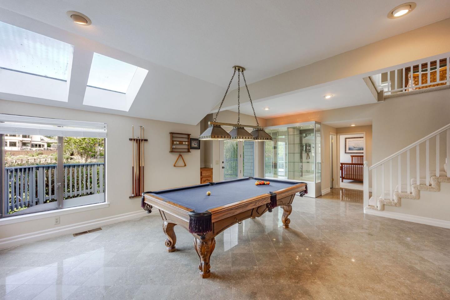 15 Ashdown Place Half Moon Bay, CA 94019 - Photo 22 of 53 a room with pool table and windows