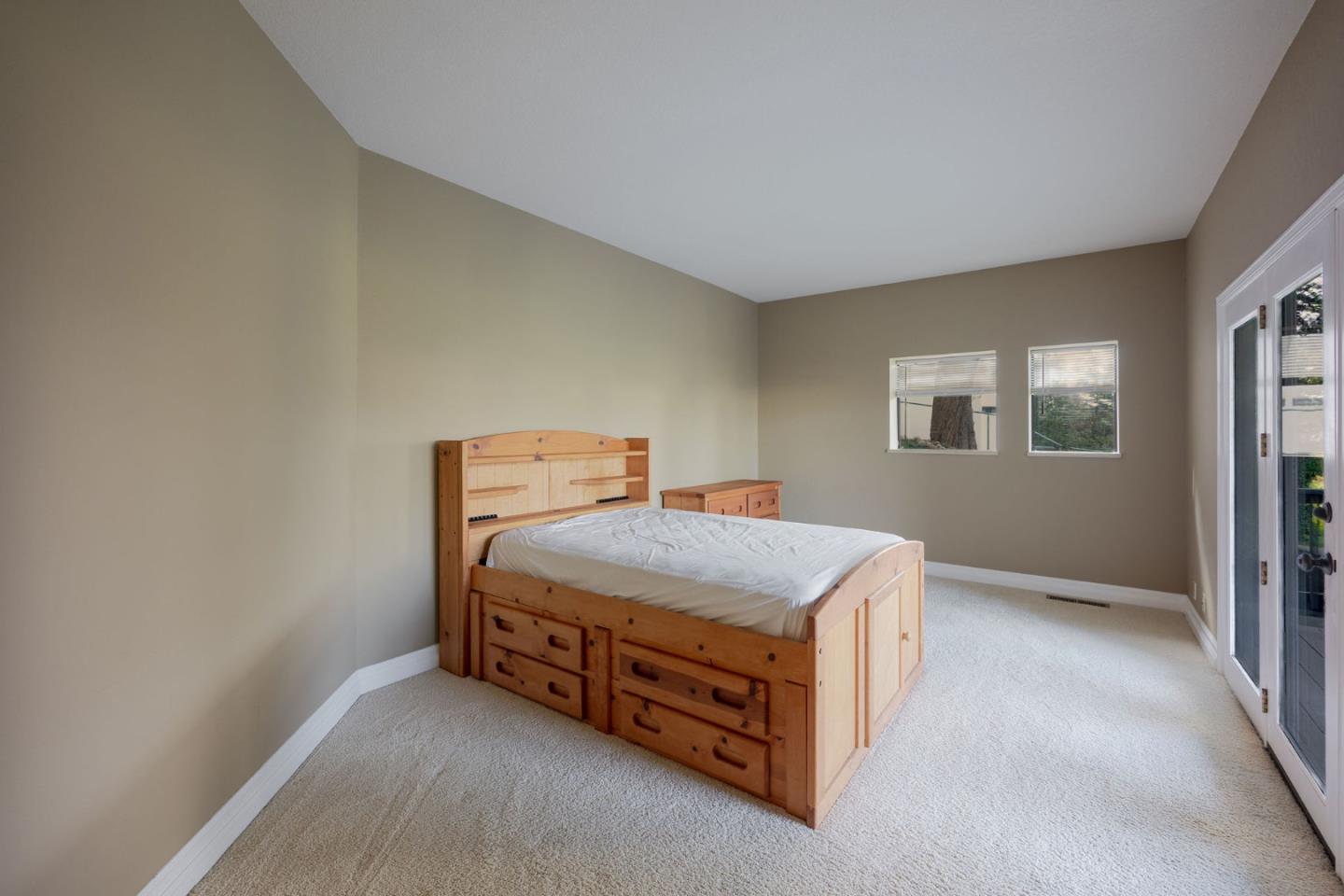 15 Ashdown Place Half Moon Bay, CA 94019 - Photo 27 of 53 a bedroom with a bed and window