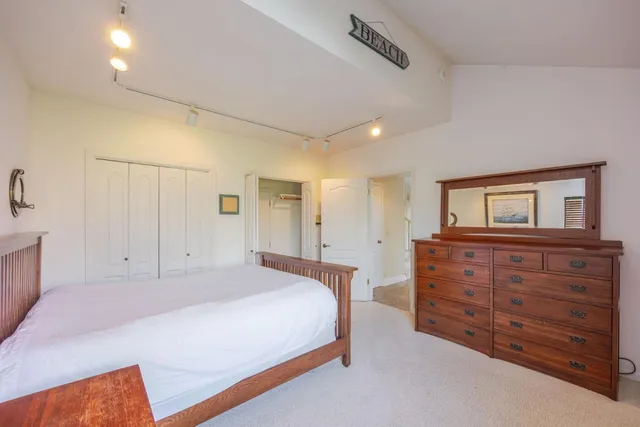 a room with furniture and air hockey table