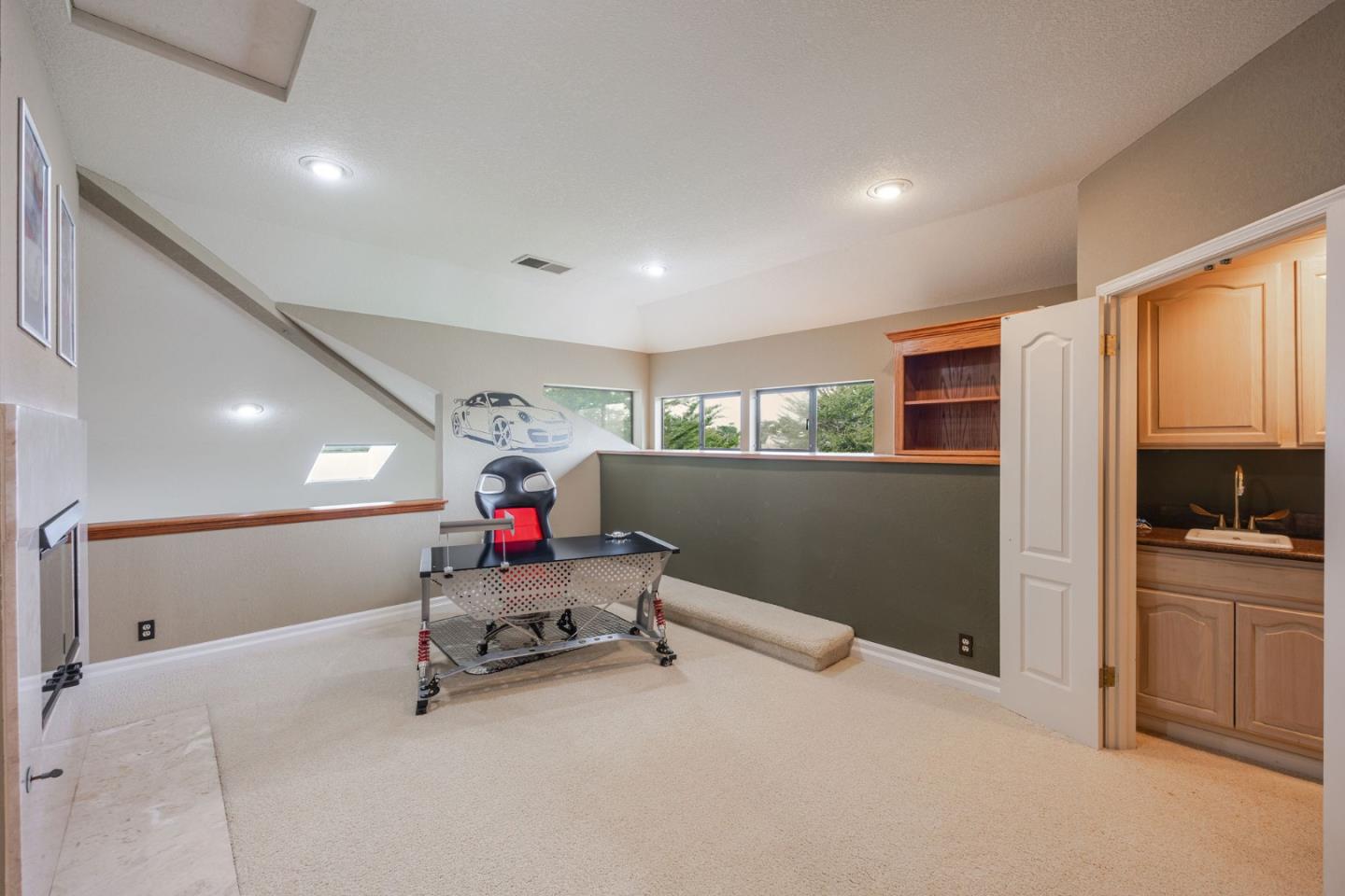 15 Ashdown Place Half Moon Bay, CA 94019 - Photo 31 of 53 a room with furniture and air hockey table