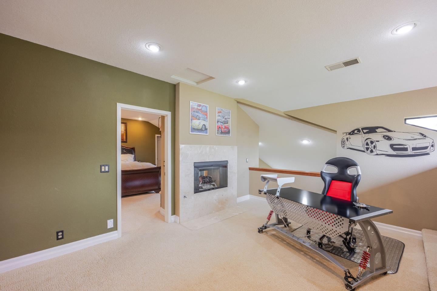 15 Ashdown Place Half Moon Bay, CA 94019 - Photo 33 of 53 a living room with furniture and a fireplace