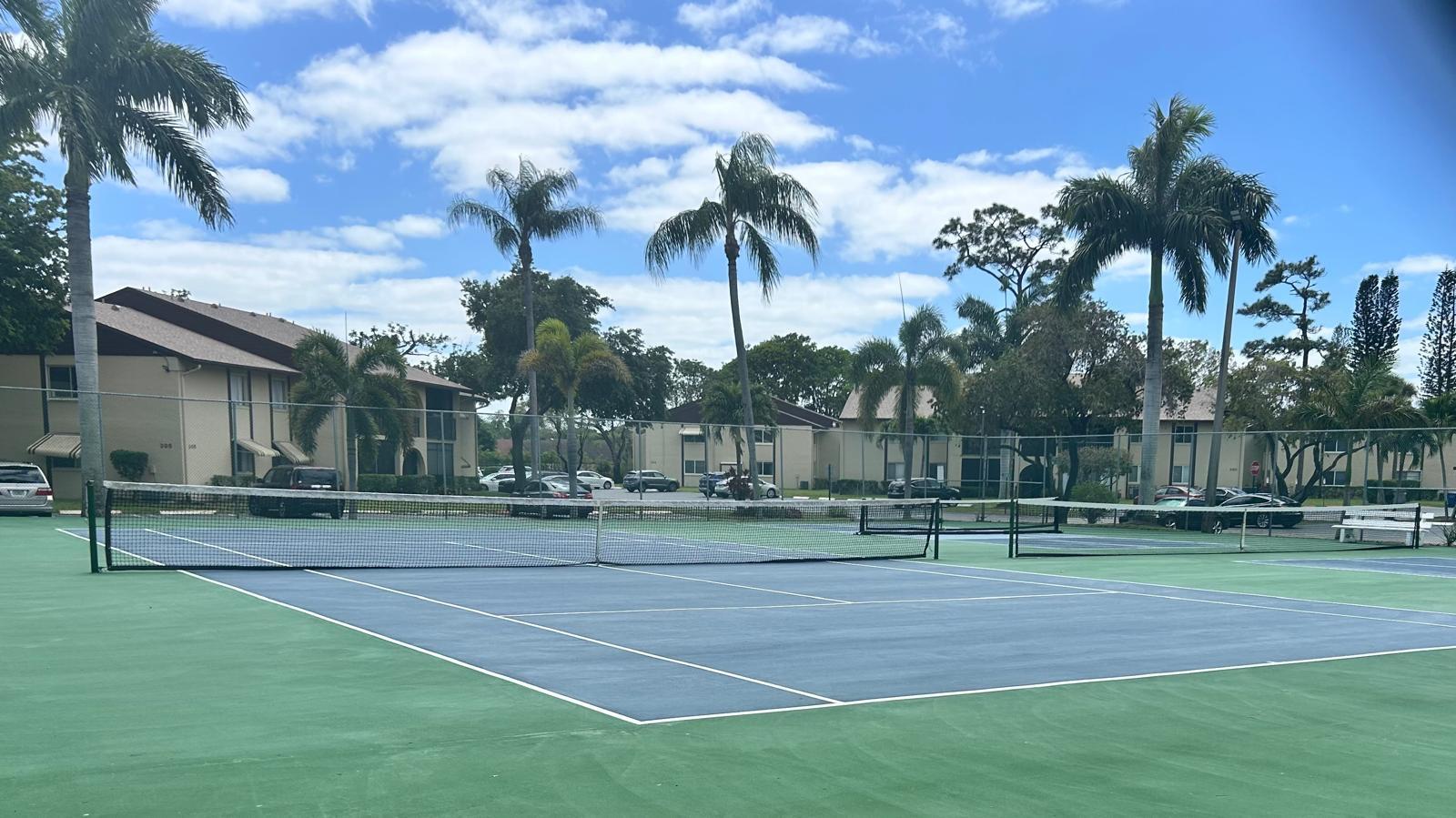 301 Pine Ridge Circle, Unit C2 Greenacres, FL 33463 - Photo 25 of 28 Tennis courts