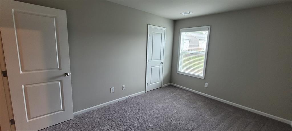 5141 Fox Den Road Oakwood, GA 30566 - Photo 23 of 29 a view of an empty room with a window