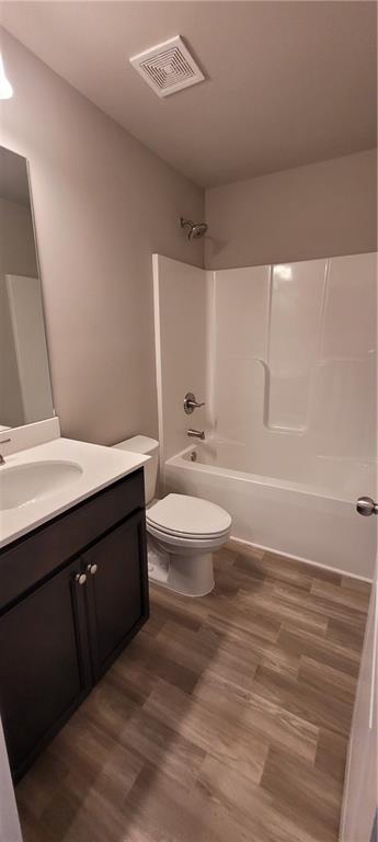 5141 Fox Den Road Oakwood, GA 30566 - Photo 24 of 29 a bathroom with a sink a toilet and shower