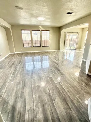 view of empty room with windows