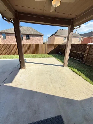 a view of backyard and porch