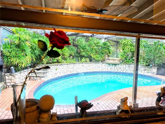 a view of swimming pool from a balcony