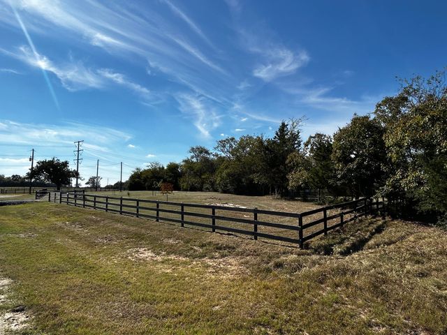a view of a lake from a yard