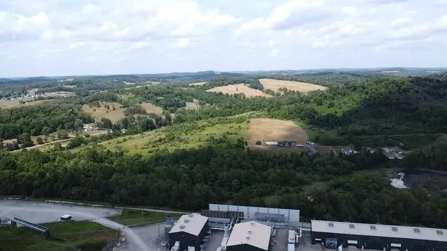 an aerial view of a house with a garden