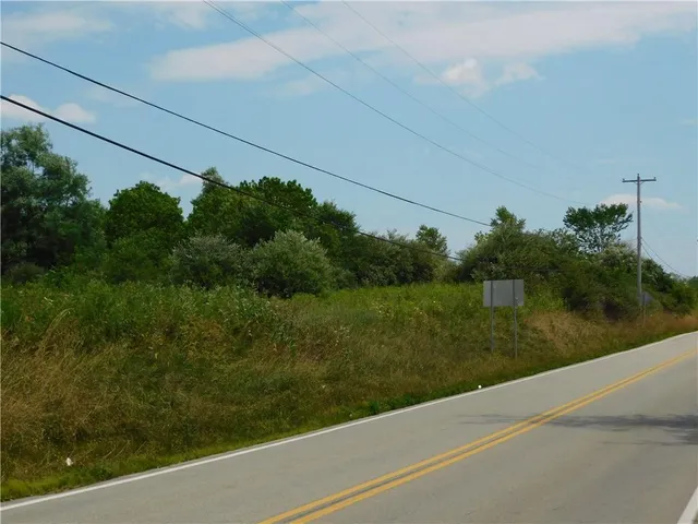 a view of a lake from a balcony