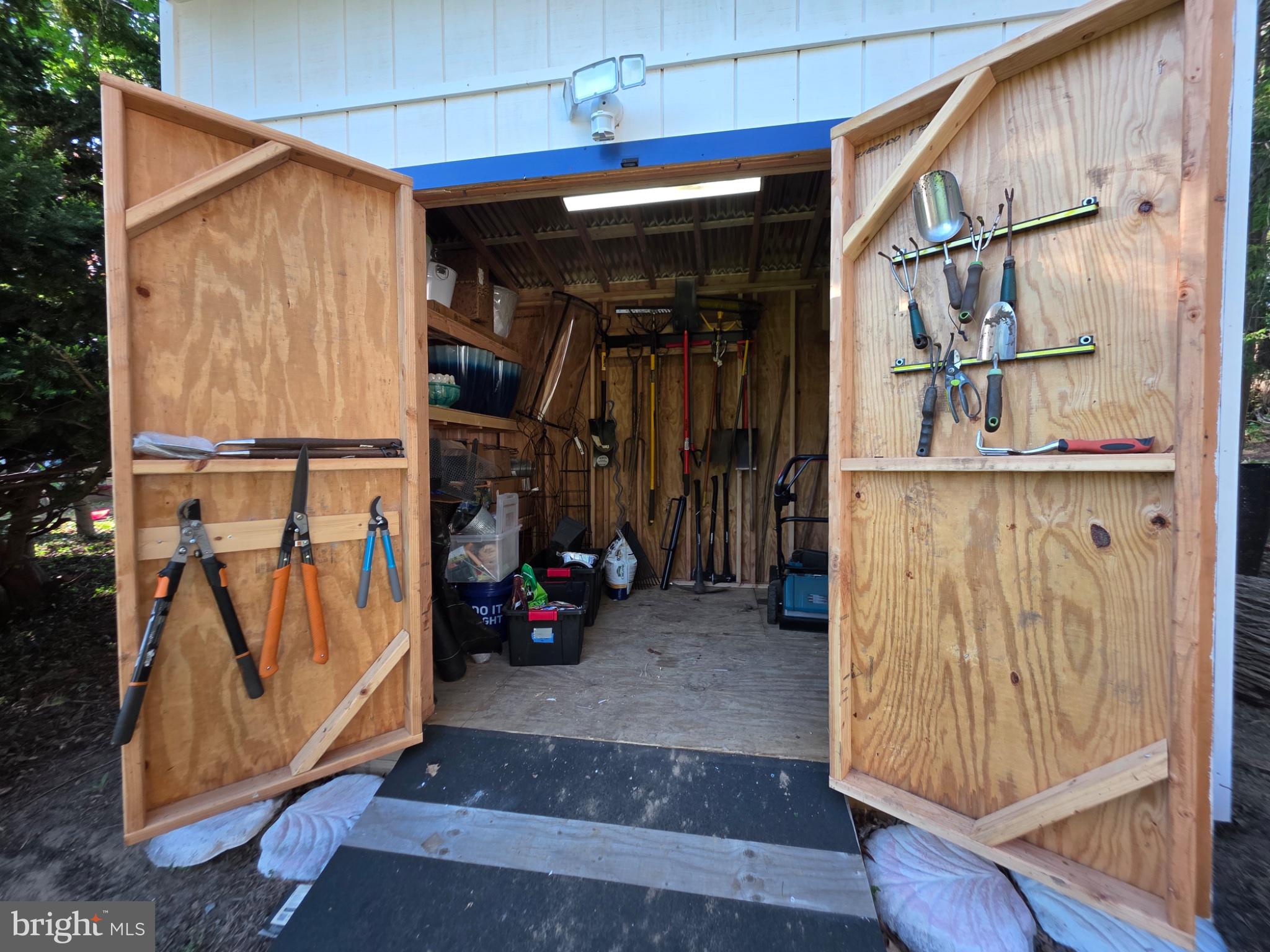 443 High Street Mount Holly, NJ 08060 - Photo 26 of 42 Well-organized tool shed awaits use.