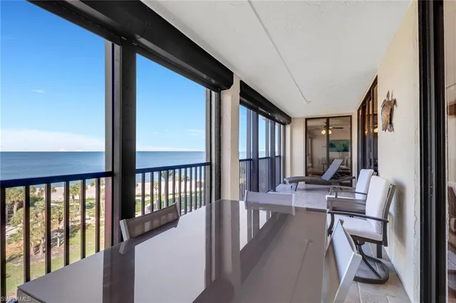 a view of a hallway with living room