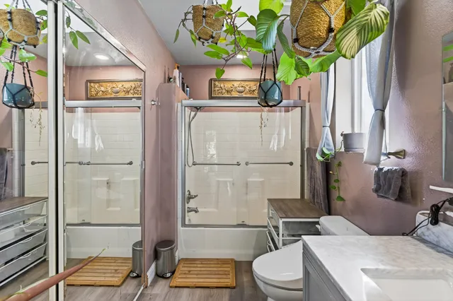 an empty room with a empty space and a ceiling fan