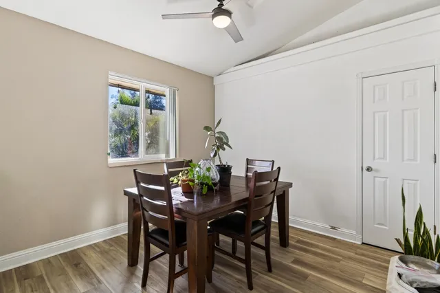 a view of a backyard with sitting area