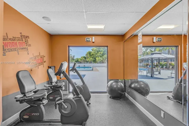 a view of a room with gym equipment