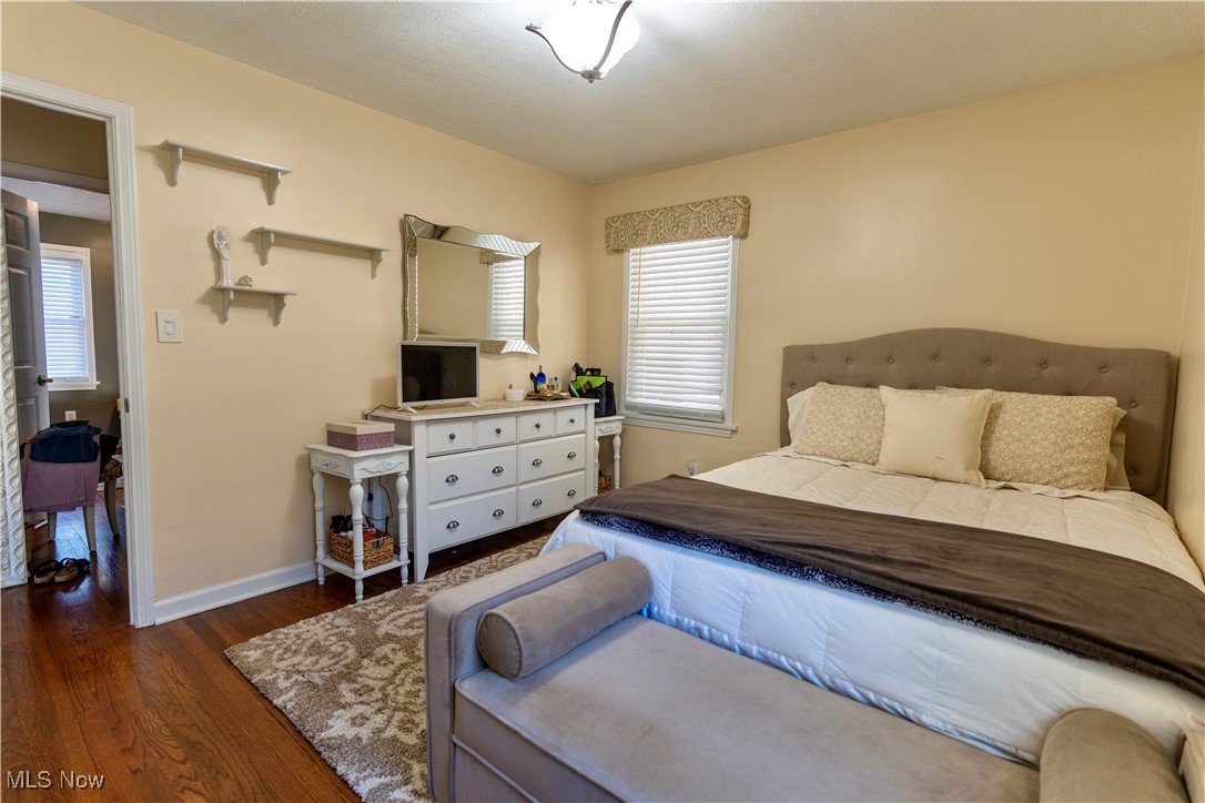1400 East Miner Road Cleveland, OH 44124 - Photo 11 of 25 Bedroom with dark hardwood / wood-style flooring
