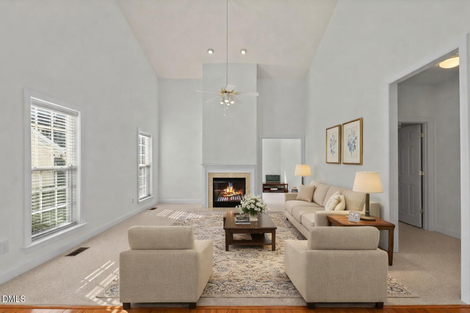 105 Rockport Ridge Way Cary, NC 27519 - Photo 15 of 43 a living room with furniture and a fireplace