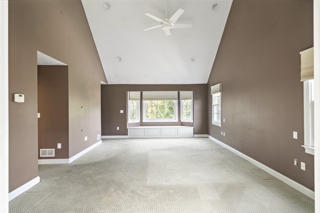 33 Bridge Street Needham, MA 02494 - Photo 11 of 19 an empty room with windows and entrance
