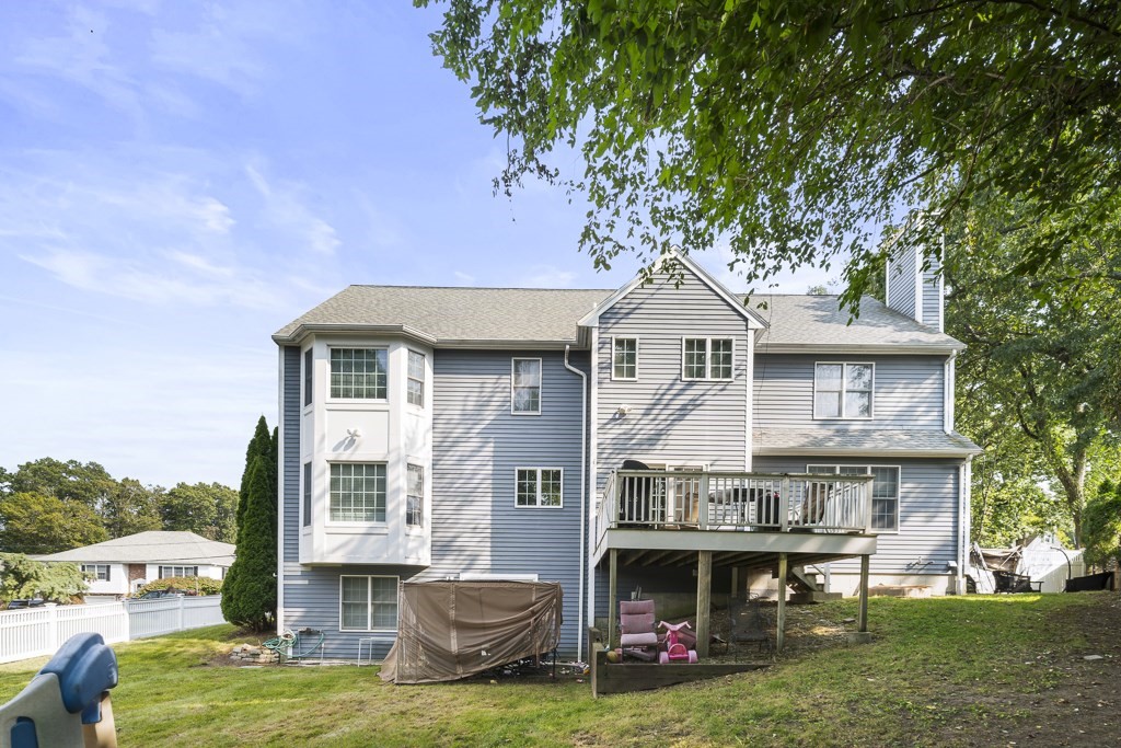 33 Bridge Street Needham, MA 02494 - Photo 18 of 19 a front view of a house with garden