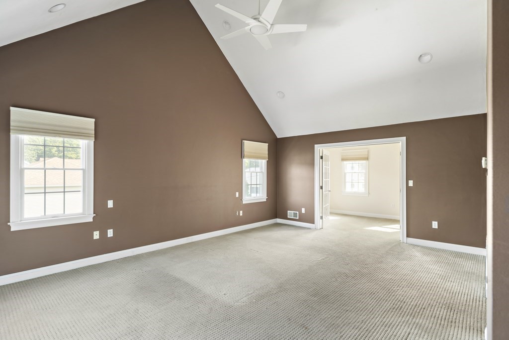 33 Bridge Street Needham, MA 02494 - Photo 10 of 19 an empty room with windows and closet