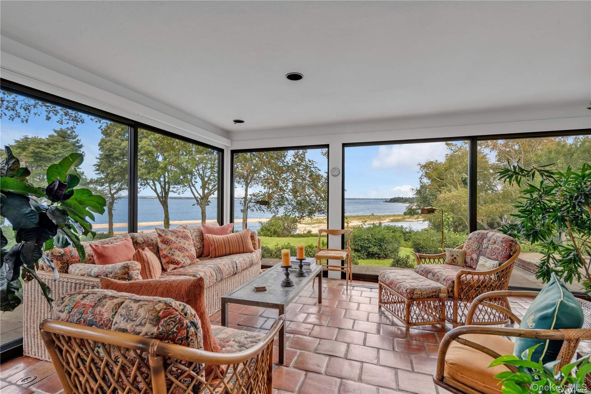 120 West Creek Farms Road Sands Point, NY 11050 - Photo 11 of 36 a living room with furniture and a large window