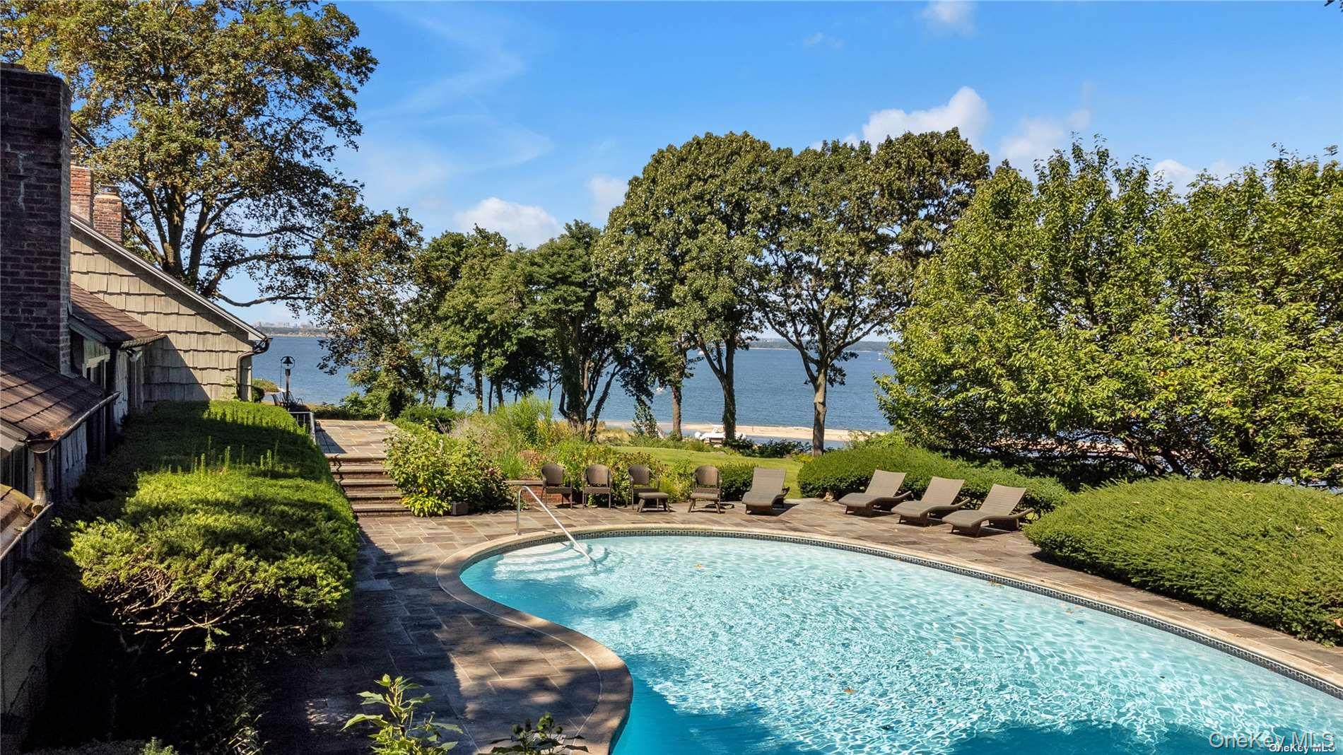 120 West Creek Farms Road Sands Point, NY 11050 - Photo 23 of 36 a view of a garden with a fountain