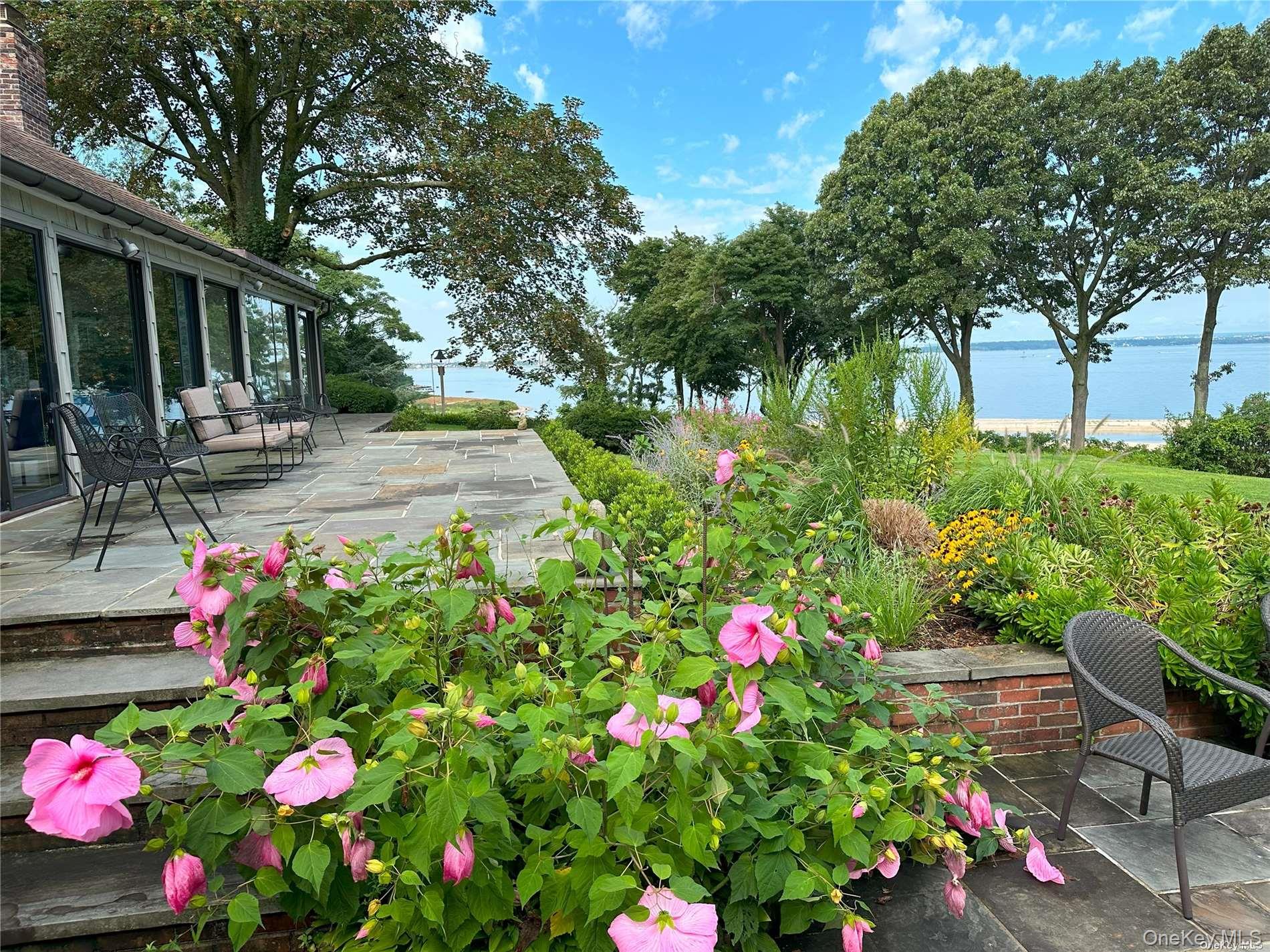 120 West Creek Farms Road Sands Point, NY 11050 - Photo 25 of 36 a front view of a house with yard